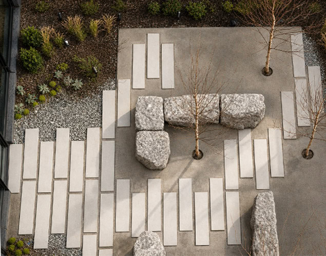 Permeable aggregate pathway designed to improve stormwater drainage at a residential landscape